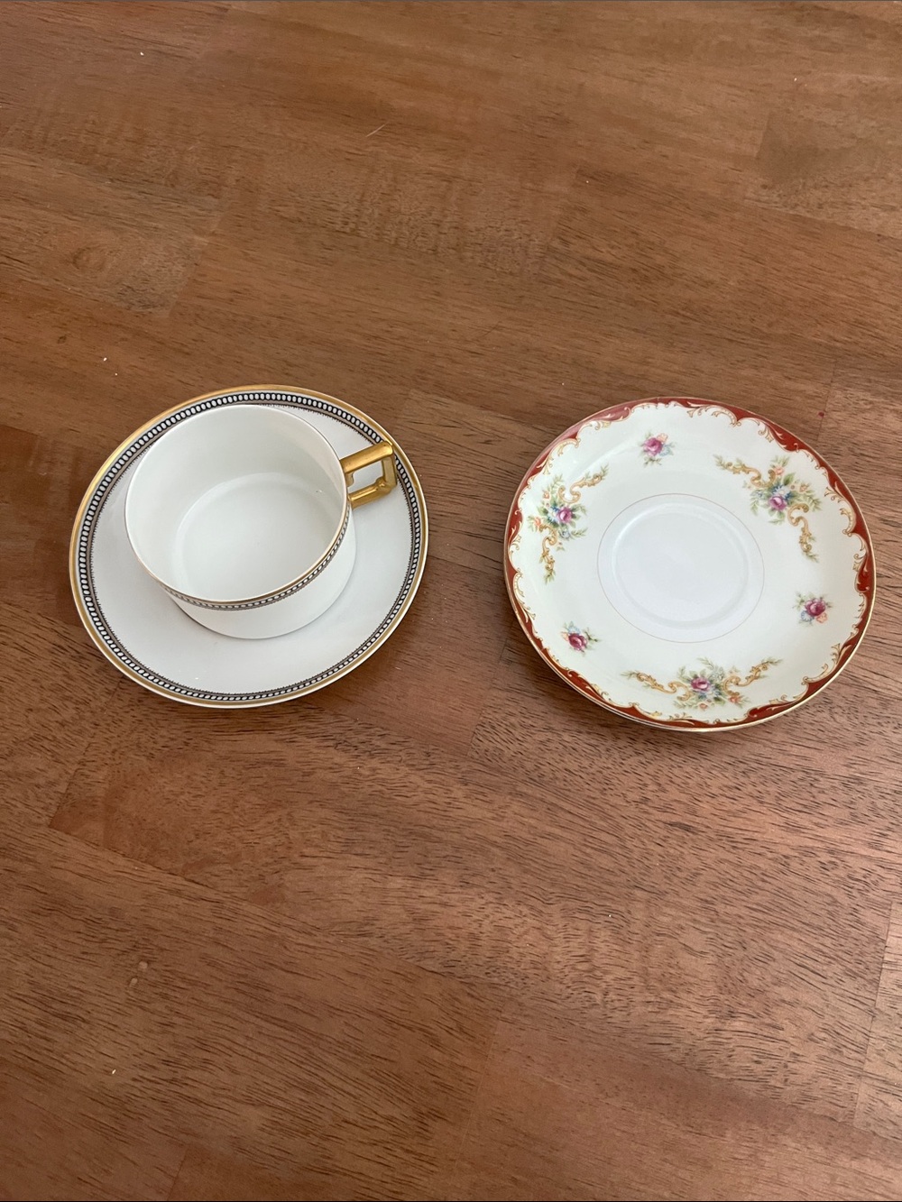 Limoges White Porcelain Teacup and Floral Saucer with Gold Trim